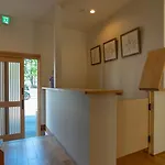 美築粟田