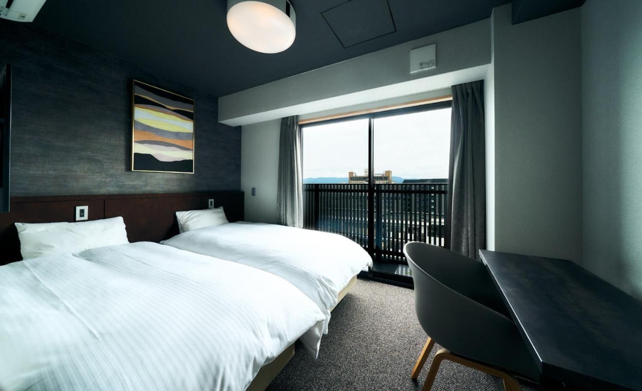 Guest house Rakuten Station Twin With Ceiling Projector Kyoto