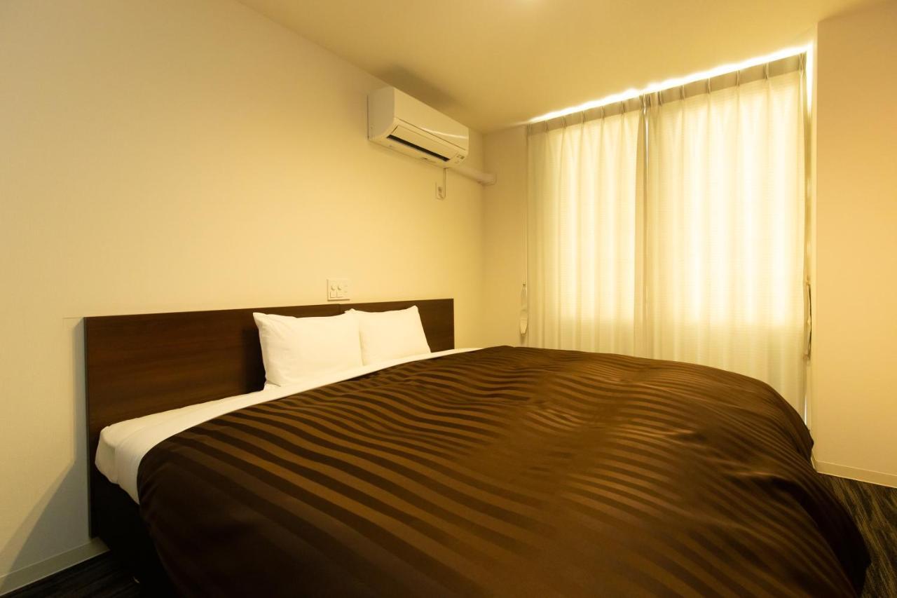 Kujo Kawaramachi Aparthotel